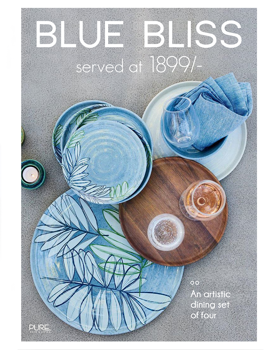 JUMPINGGOOSE in-store signage for Pure Home + Living showcasing the Blue Bliss dining set through premium retail communication.